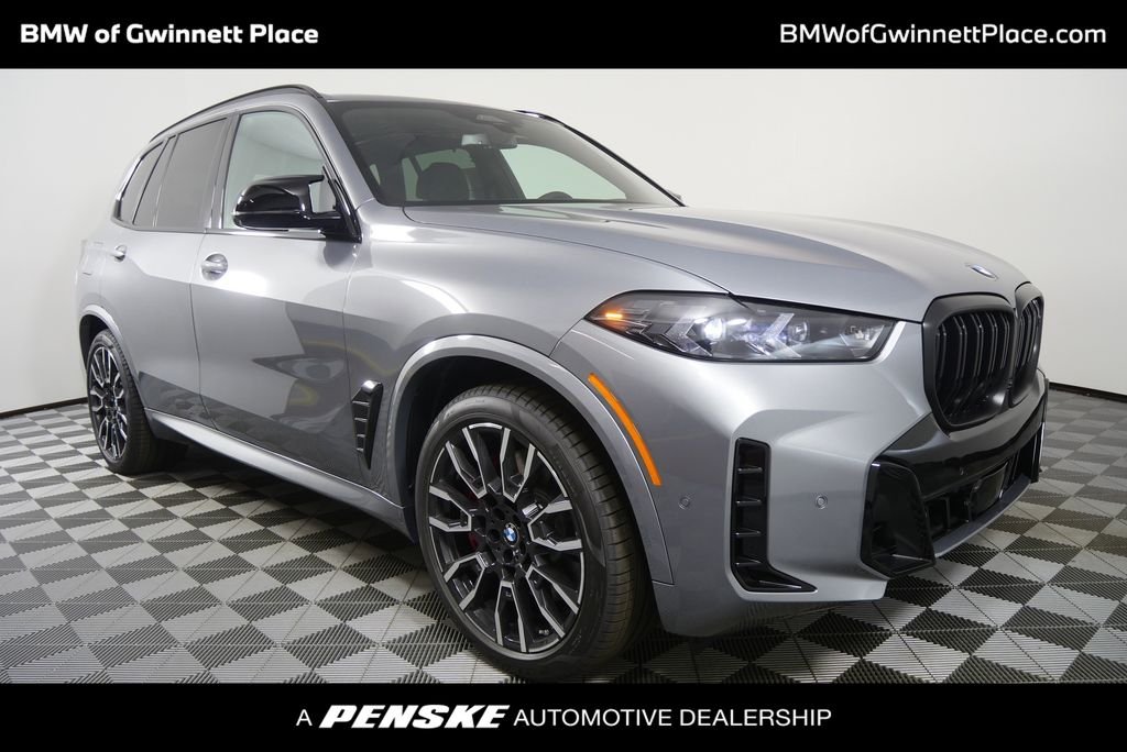 Used 2026 Skyscraper Grey Metallic BMW M60i image 1