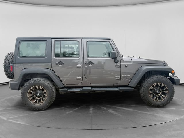 Used 2014 Jeep Wrangler Unlimited Sport with VIN 1C4BJWDG6EL222676 for sale in Ankeny, IA