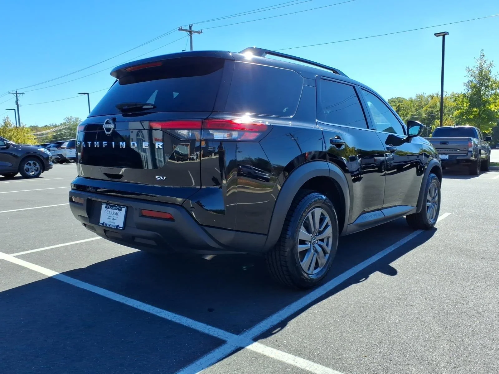 Used 2024 Super Black Nissan SV image 2