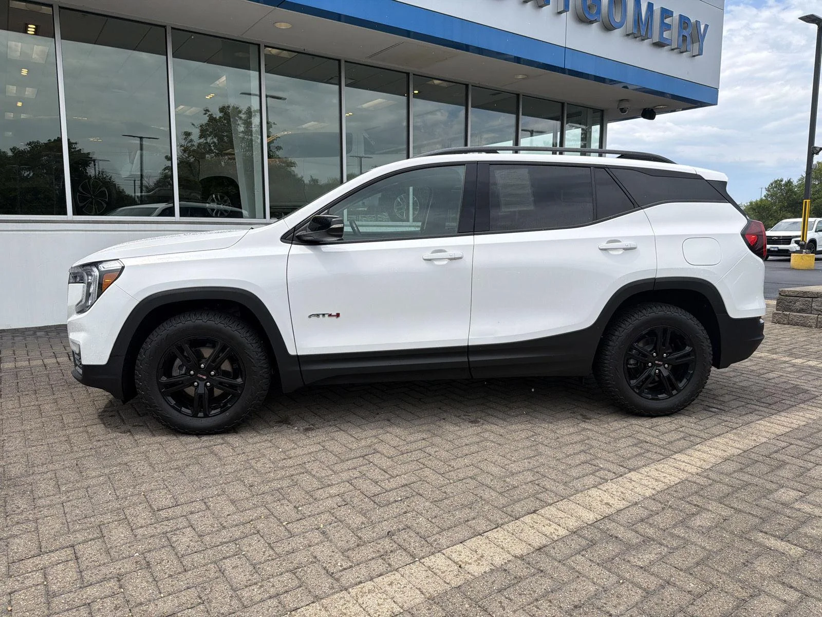 Used 2023 Summit White GMC AT4 image 2