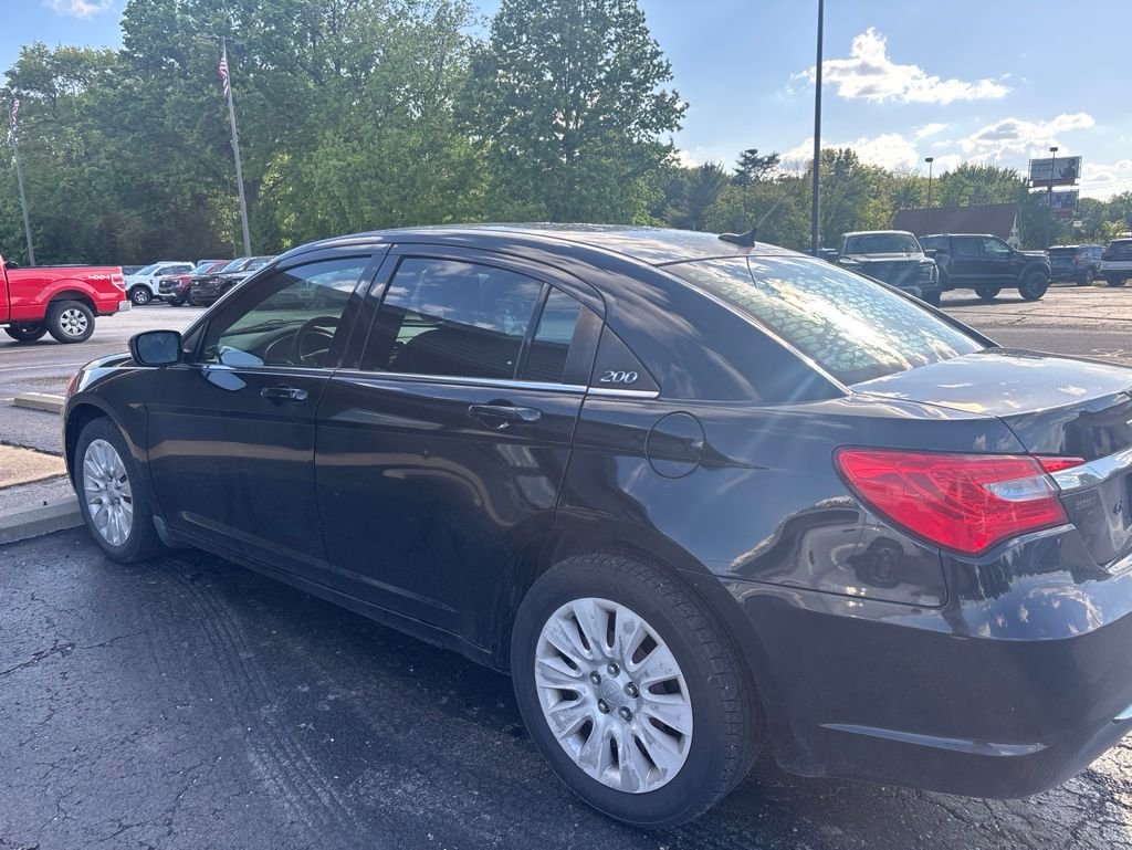 Used 2012 Black Clearcoat Chrysler LX image 6