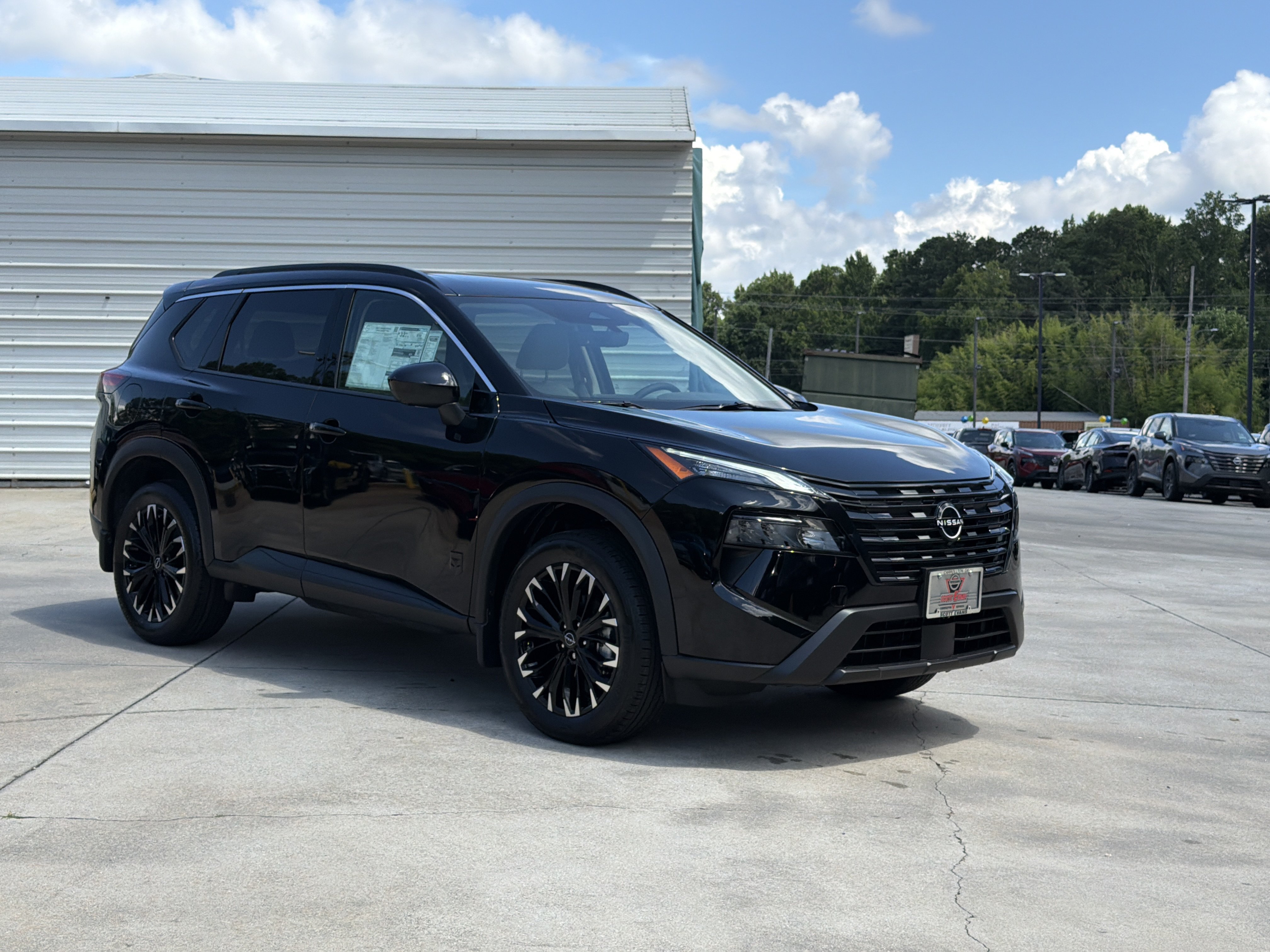 New 2026 Super Black Nissan Dark Armor image 2