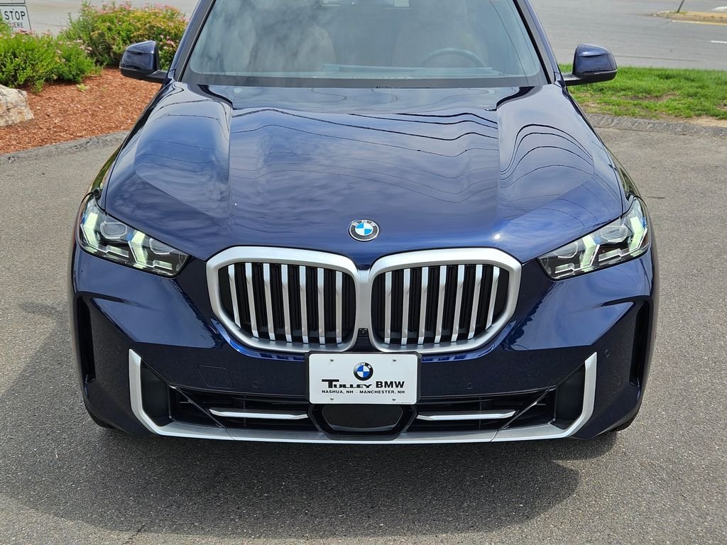 Used 2026 Tanzanite Blue II Metallic BMW xDrive40i image 8