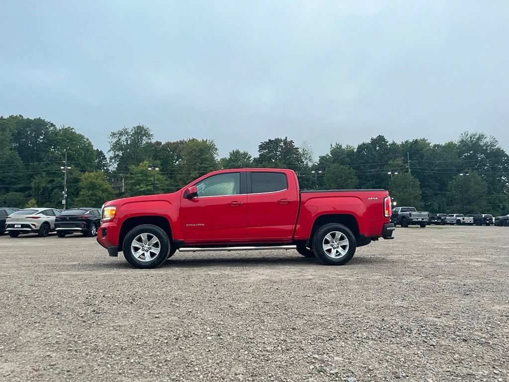 Used 2016 CARDINAL RED GMC 4WD SLE image 10