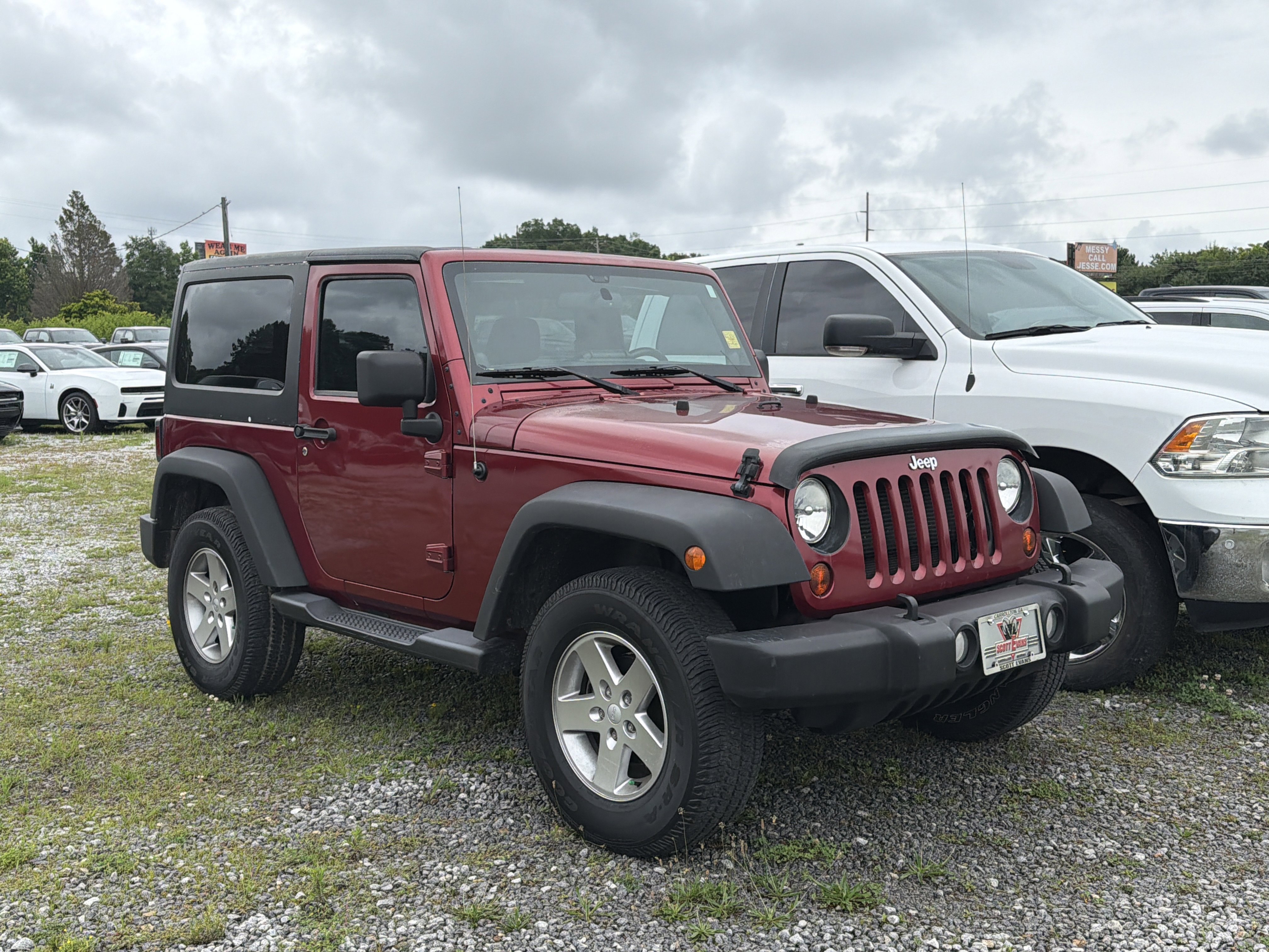 Used 2013 Deep Cherry Red Crystal Pearl Jeep Sport image 1