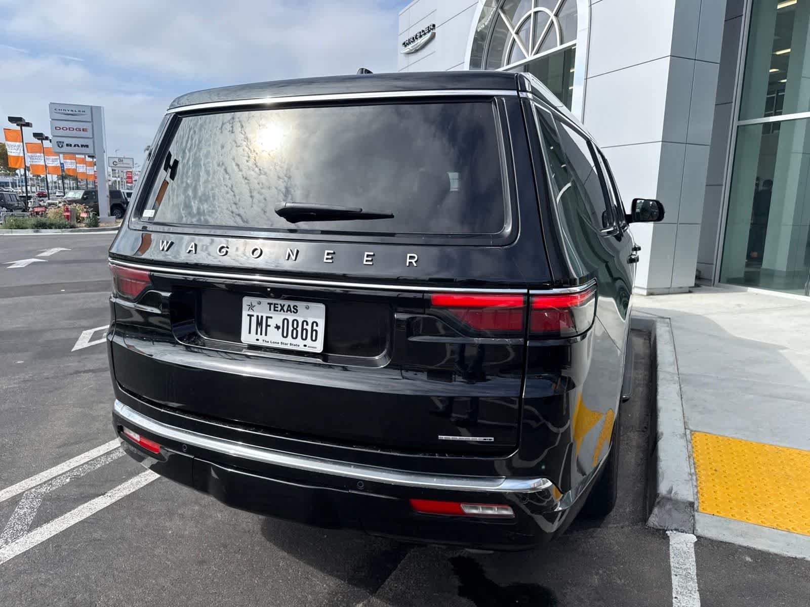 Used 2024 Diamond Black Crystal Pearlcoat Jeep Series II image 12