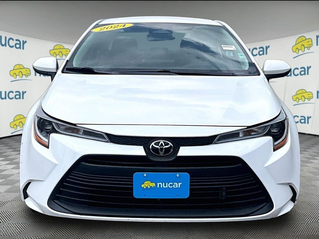 Used 2024 White Toyota LE image 2