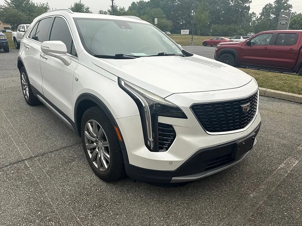 Used 2019 Crystal White Cadillac Premium Luxury image 1