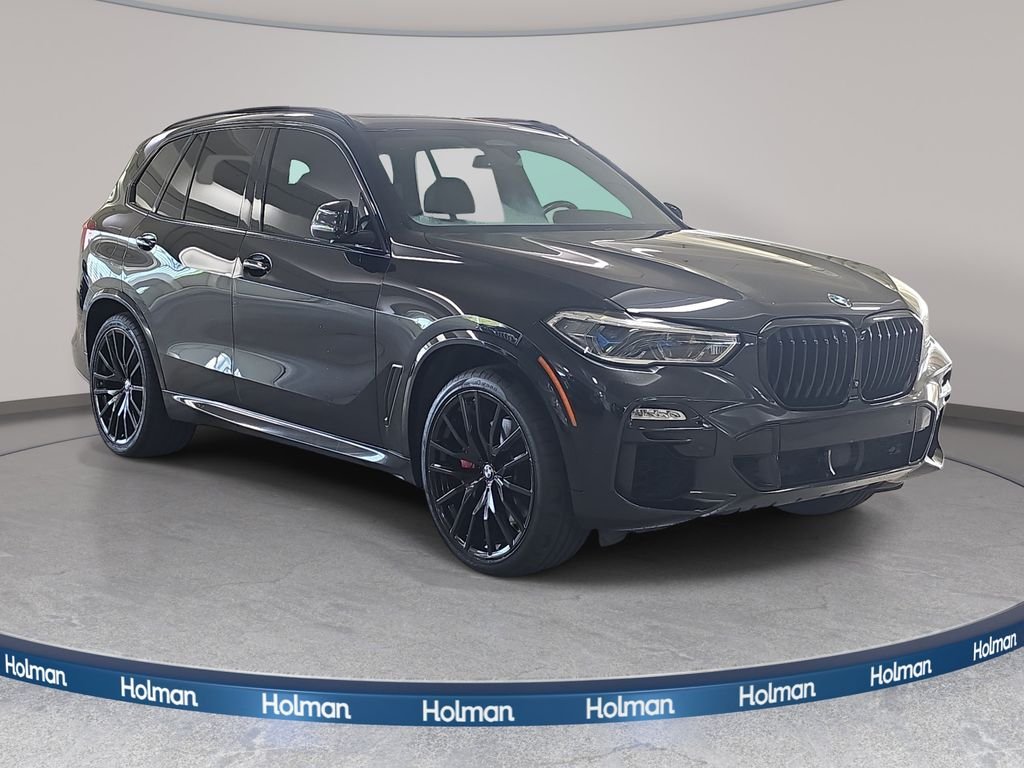 Used 2021 Black Sapphire Metallic BMW sDrive40i image 4