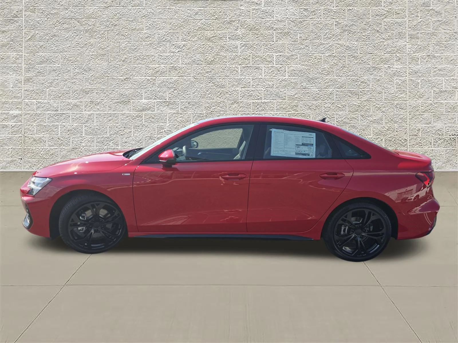 New 2026 Progressive Red Metallic Audi Premium Plus image 4