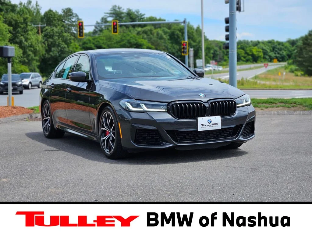 Certified Used 2023 Dark Graphite Metallic BMW M550i xDrive image 1