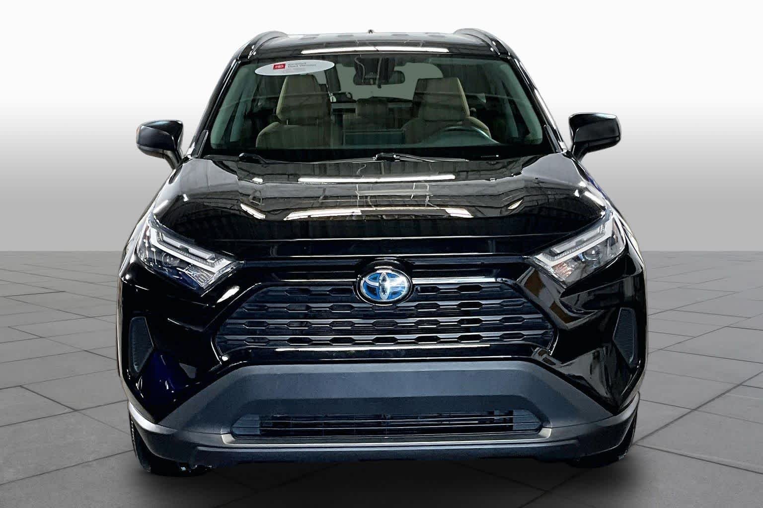 Used 2024 Midnight Black Metallic Toyota Hybrid LE image 4