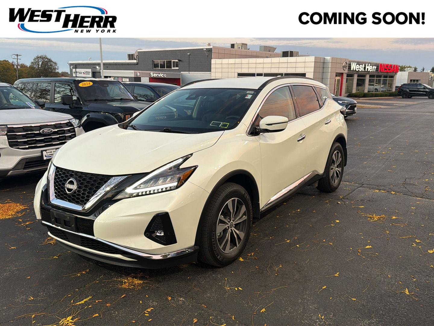 Used 2024 Pearl White Tricoat Nissan SV image 1