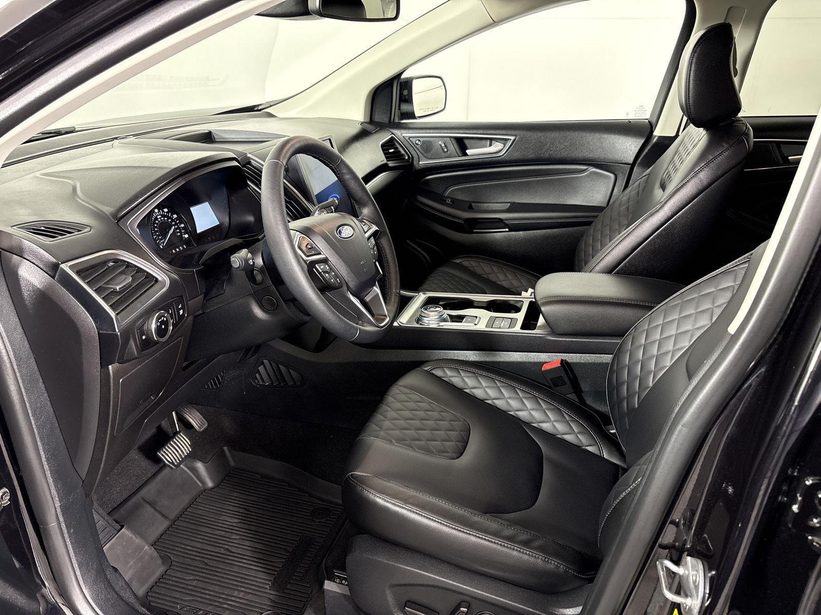 Used 2024 Agate Black Metallic Ford Titanium image 5