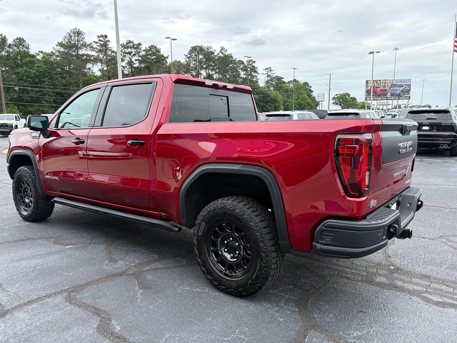 Used 2026 Volcanic Red Tintcoat GMC AT4X image 14