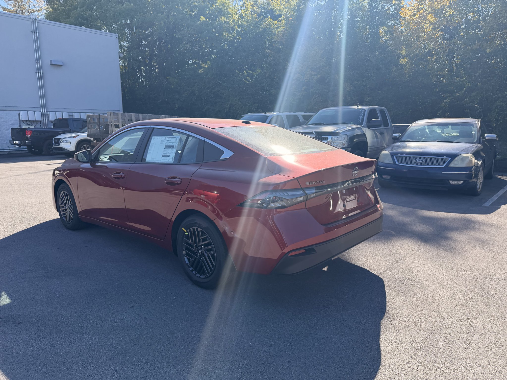New 2027 Scarlet Ember Tintcoat Nissan SV image 5