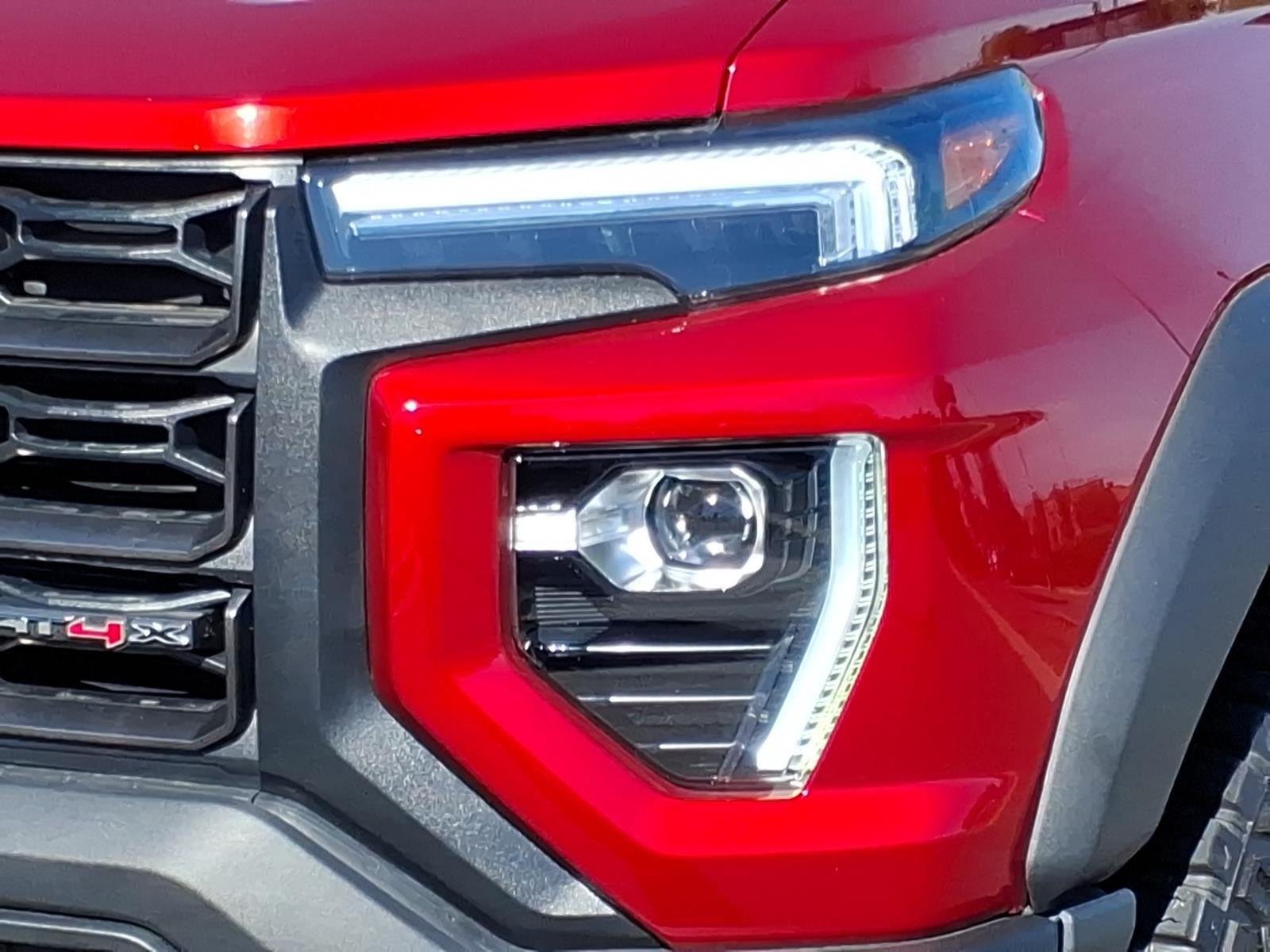 Used 2024 Volcanic Red Tintcoat GMC 4WD AT4X image 16