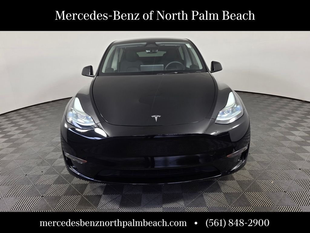 Used 2025 Tesla Model Y Long Range with VIN 7SAYGDED7SF253633 for sale in Palm Beach Gardens, FL