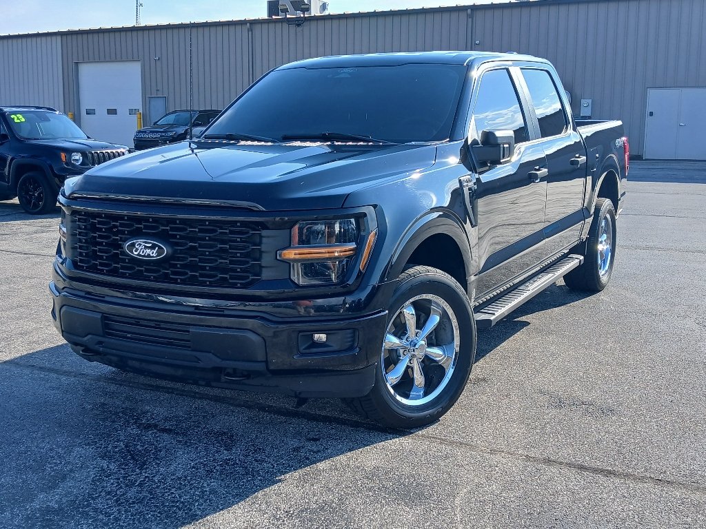Used 2024 Agate Black Metallic Ford STX image 1