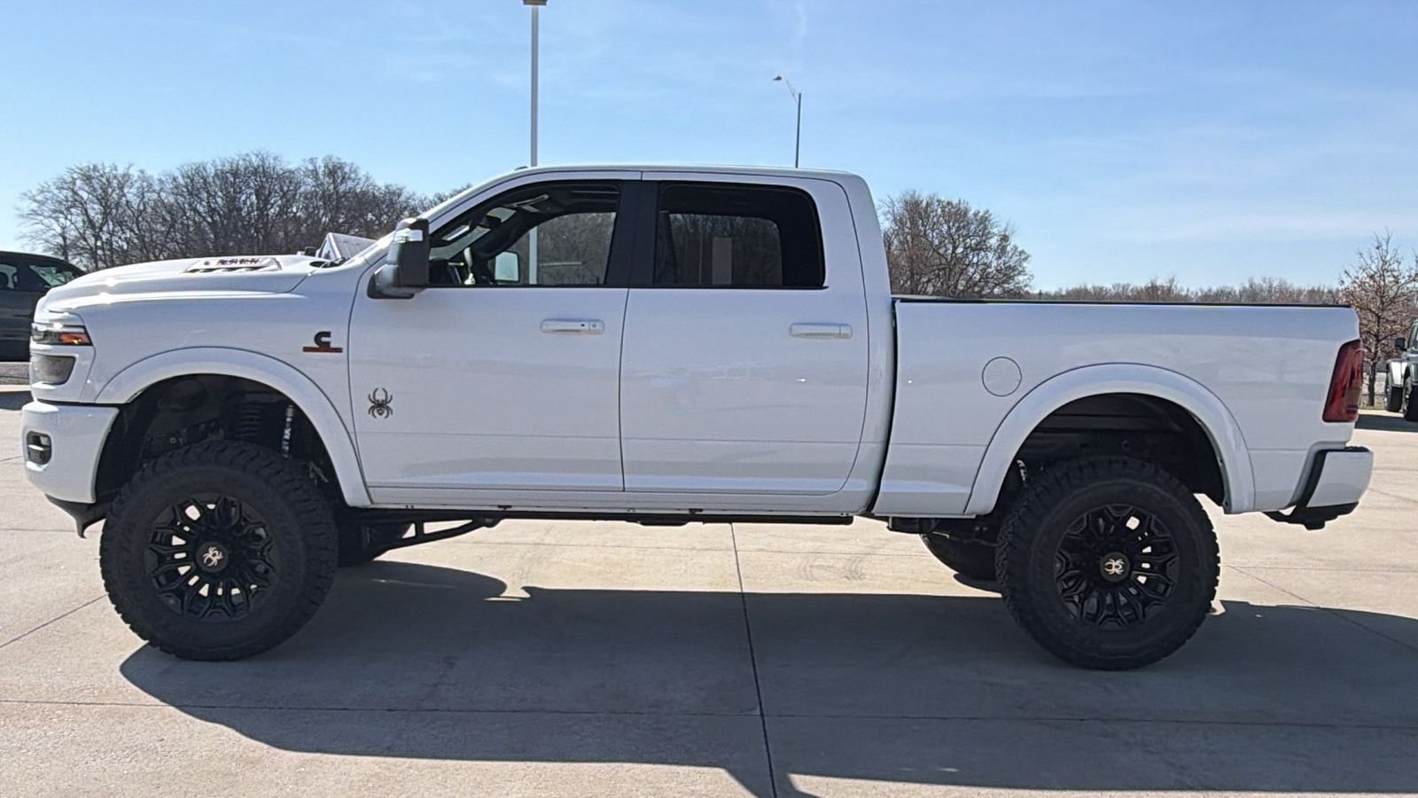 New 2026 Bright White Clear-Coat Exterior Paint RAM Laramie image 5