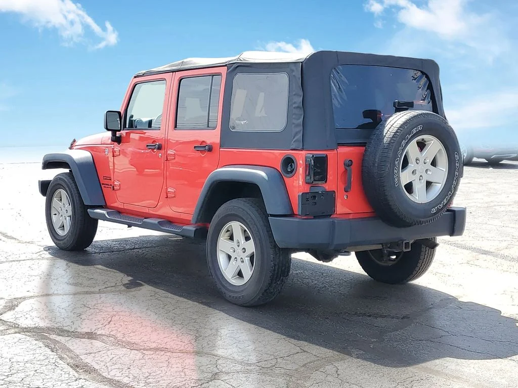 Used 2013 Red Jeep Unlimited Sport image 3