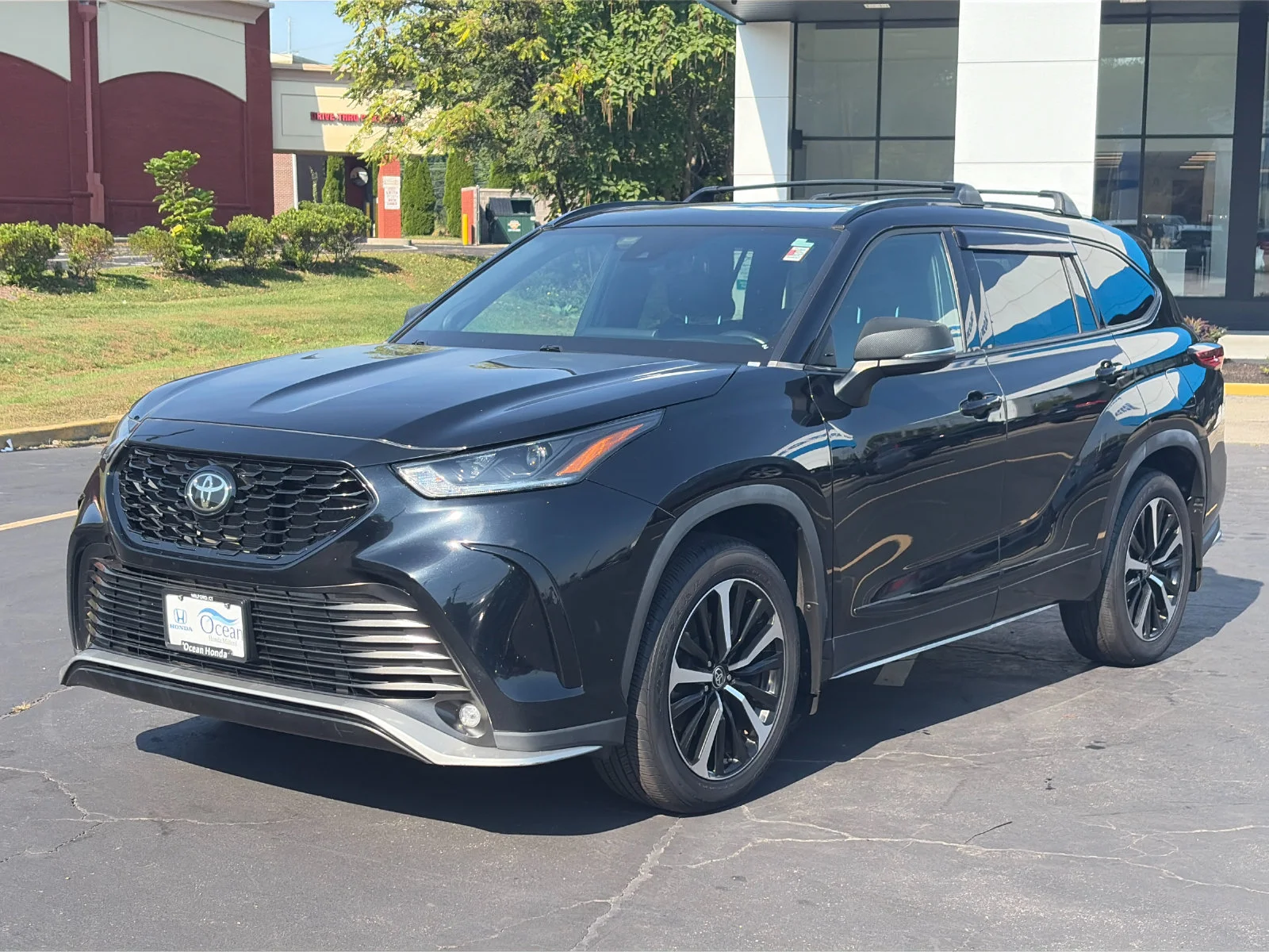 Used 2021 Midnight Black Metallic Toyota XSE image 1