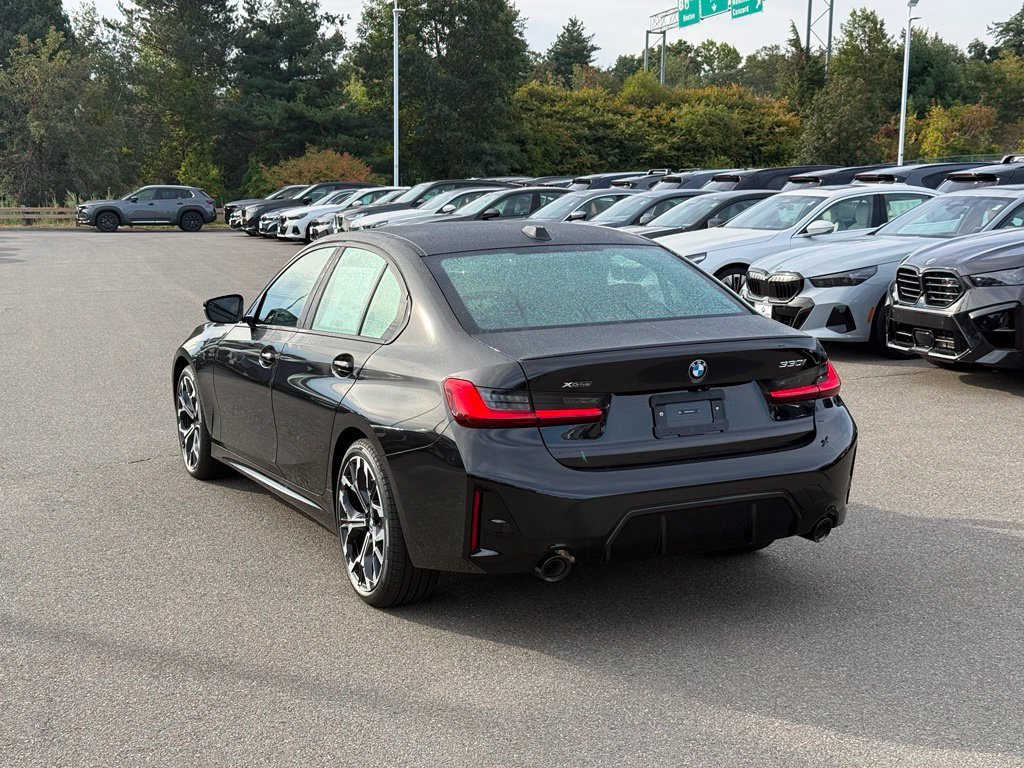New 2026 Black BMW 330i xDrive image 3