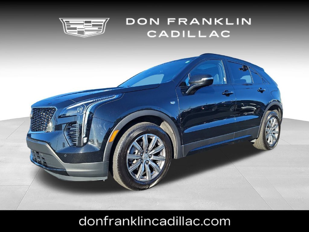 Used 2023 Black Cadillac Sport image 1
