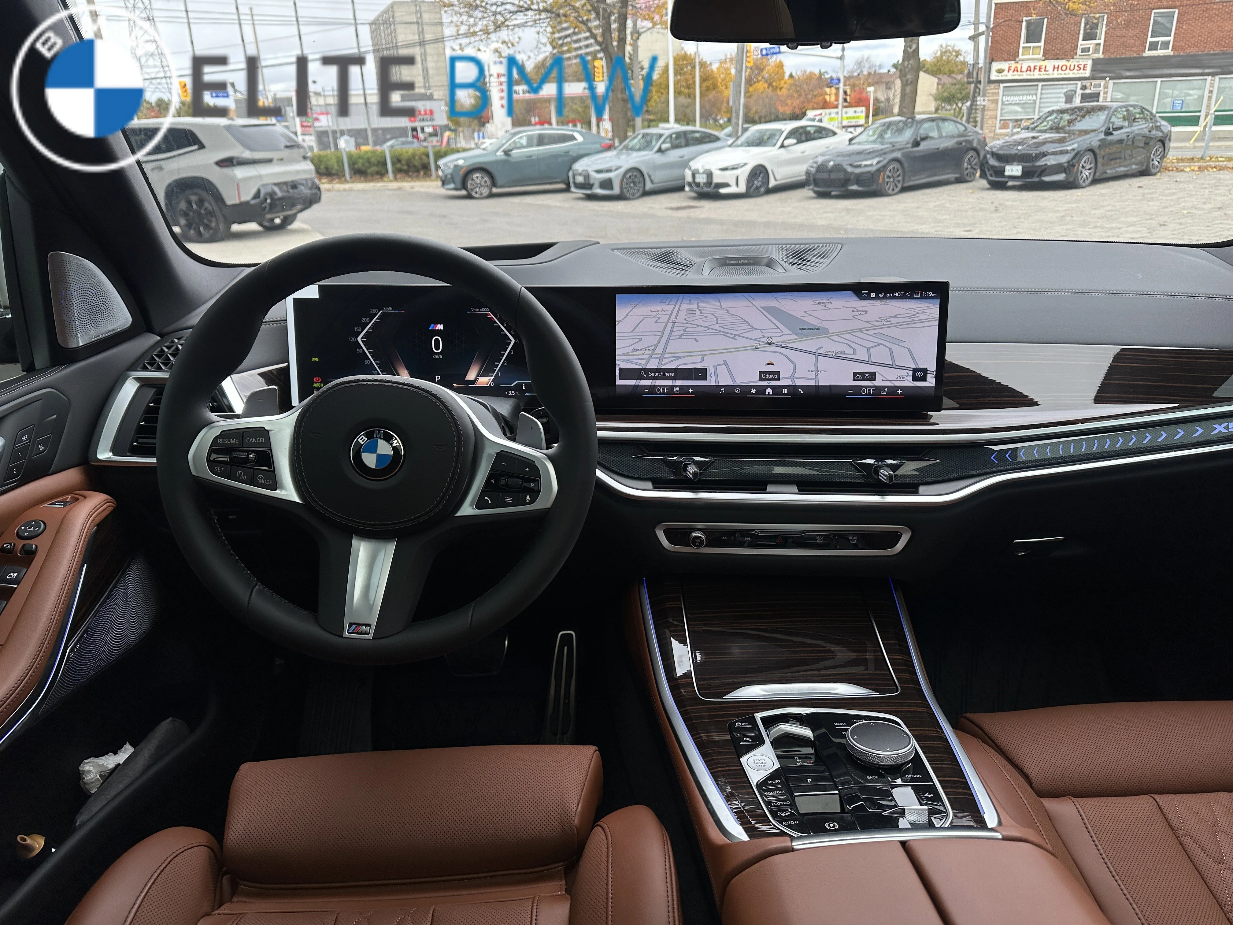 Used 2026 BLACK SAPPHIRE METALLIC BMW XDRIVE40I image 11