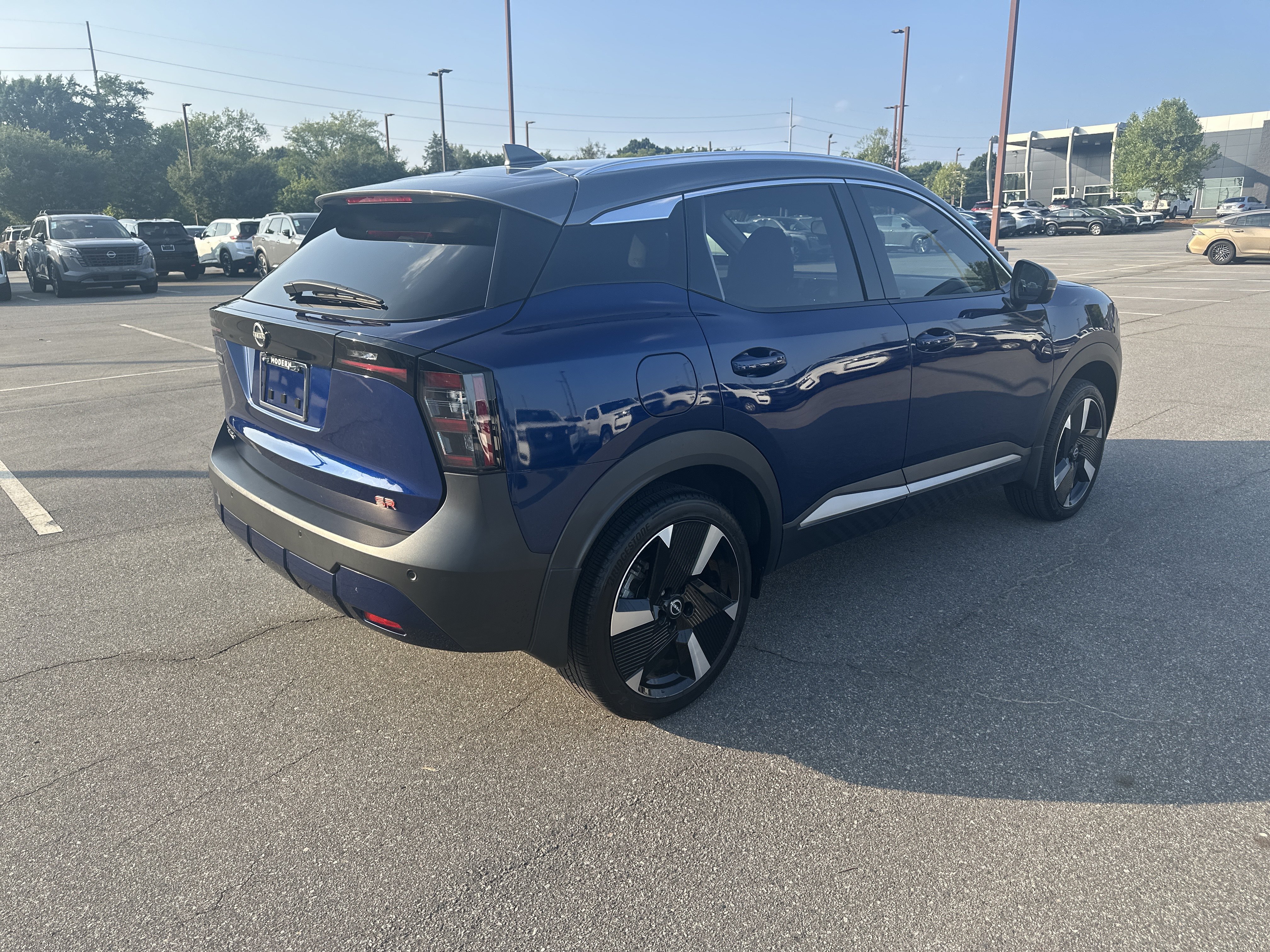 Certified Used 2025 Deep Blue Pearl/Gun Metallic Nissan SR image 5
