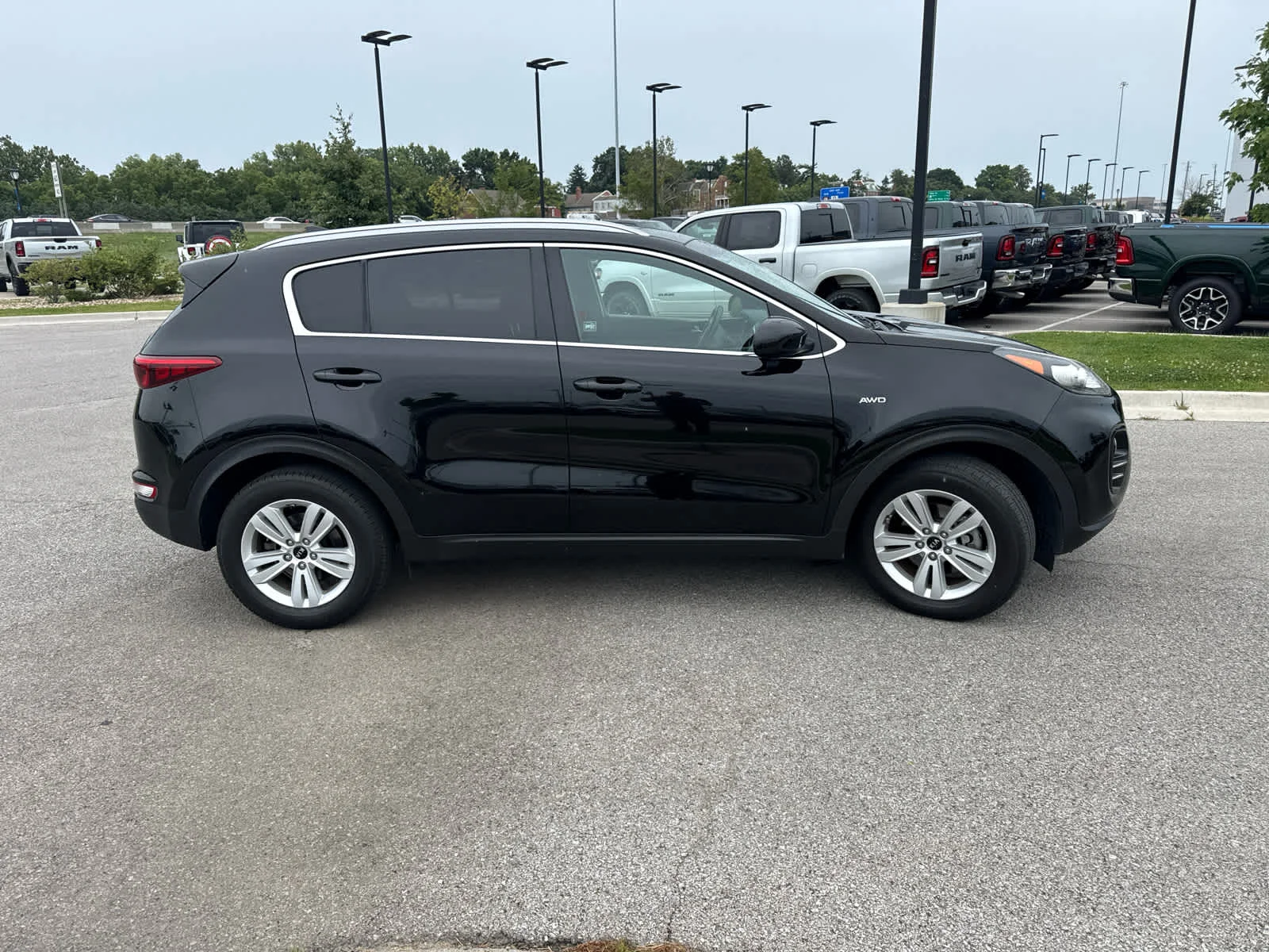 Used 2018 Black Cherry Kia LX image 4