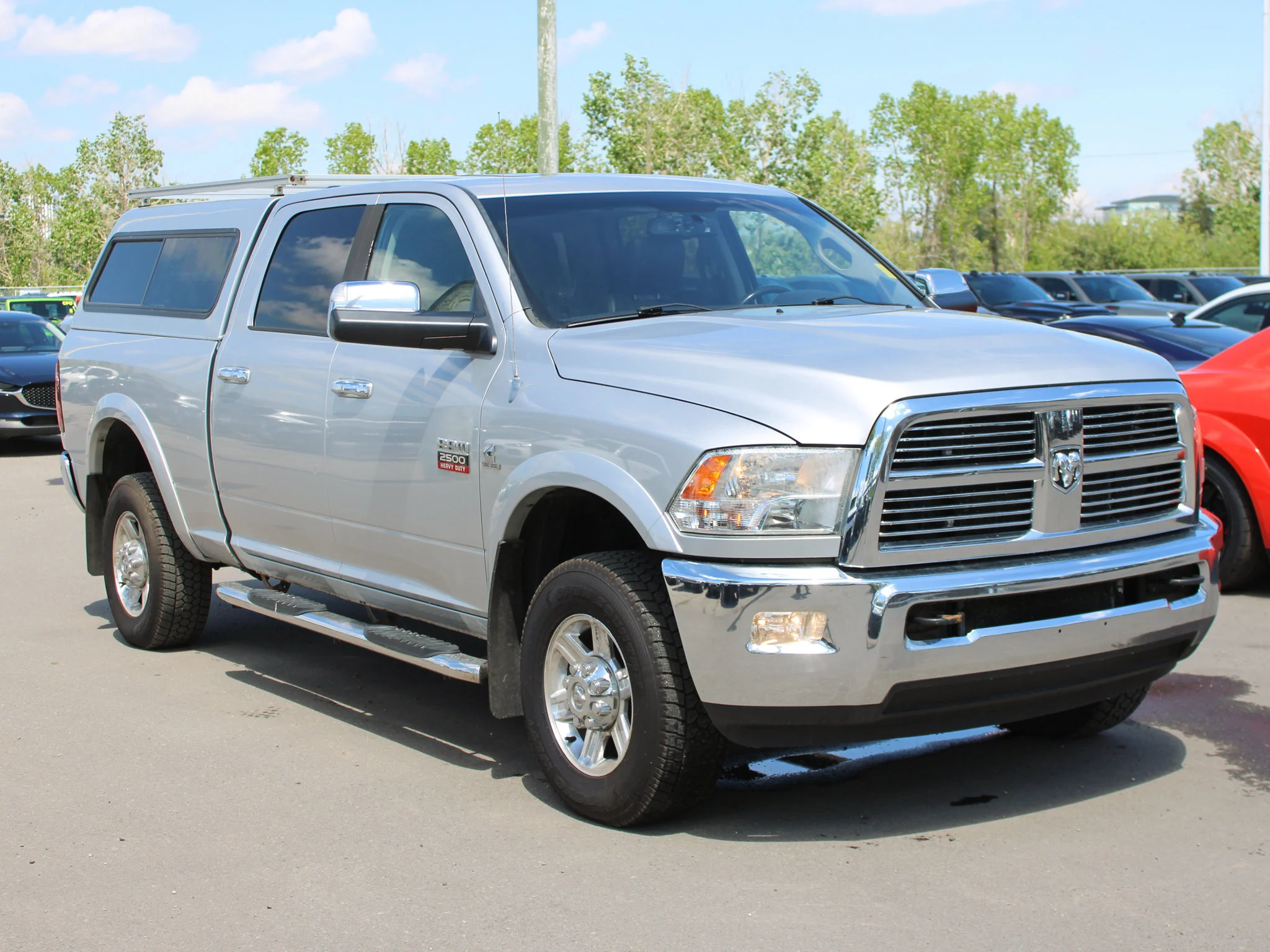 Used 2012 Silver RAM Laramie * Mechanic Special | Cummins | Heated Leather Seats | Canopy | Navigation image 7