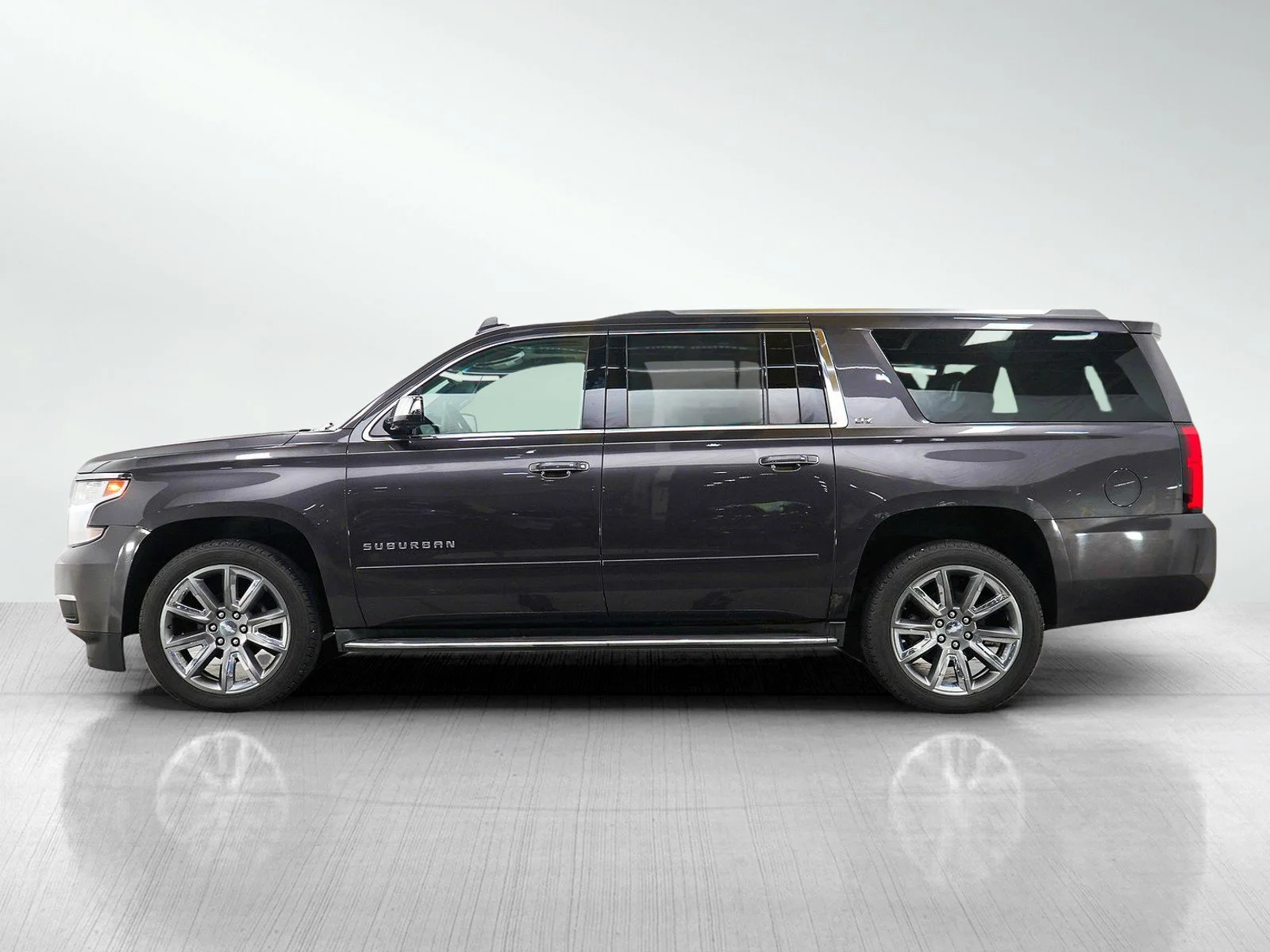 Used 2016 Chevrolet Suburban LTZ with VIN 1GNSKJKC0GR211065 for sale in Roseville, Minnesota