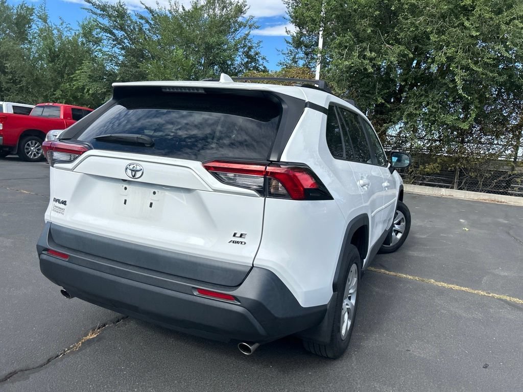 Used 2021 Super White Toyota LE image 5