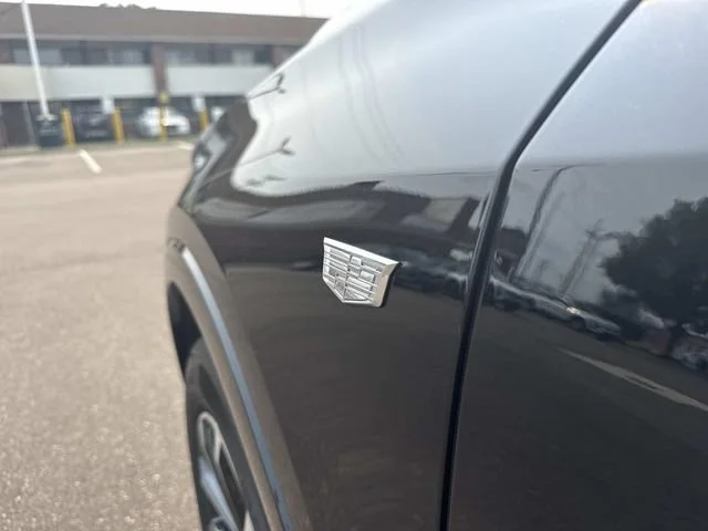 Used 2025 Stellar Black Metallic Cadillac Sport image 12