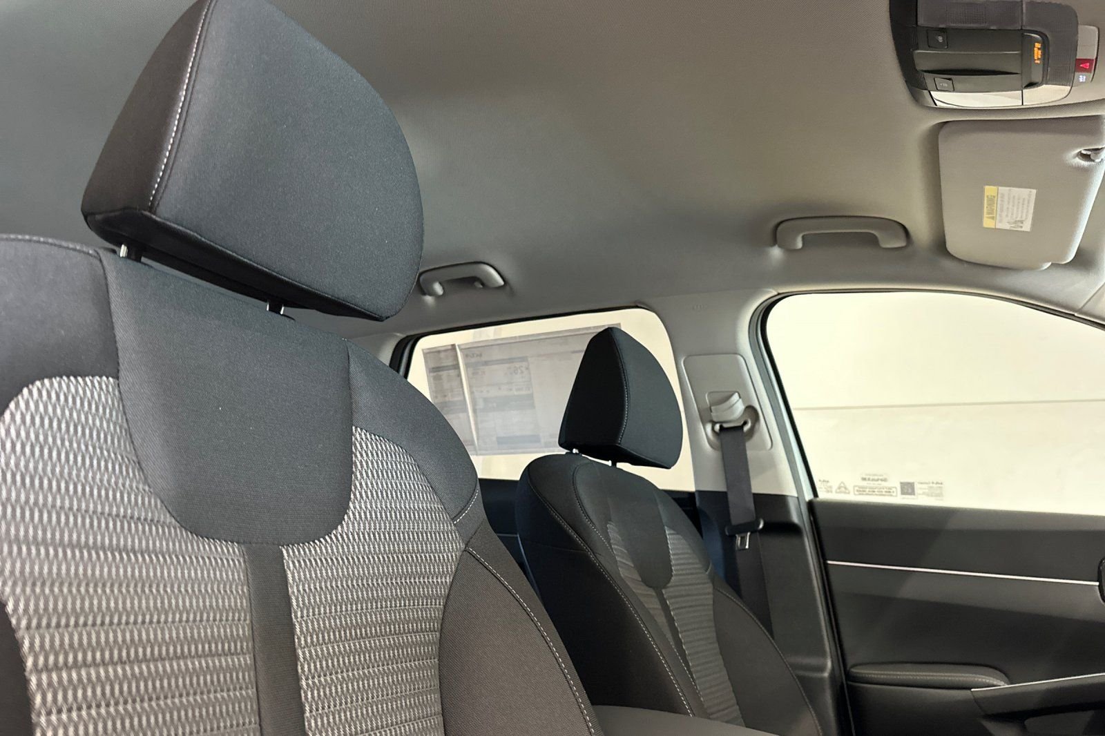 New 2026 Ivory Silver Kia LX image 14