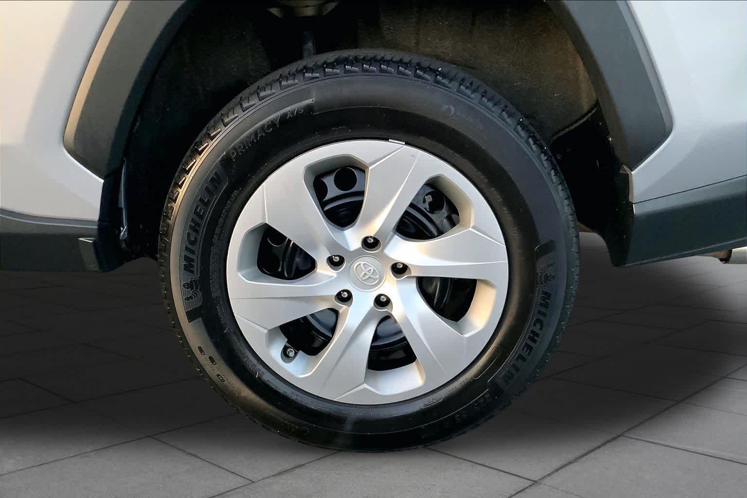 Used 2021 Silver Sky Metallic Toyota LE image 11
