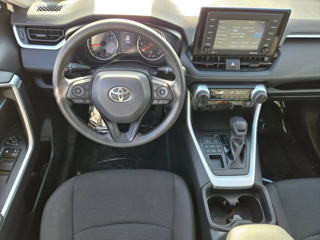 Used 2021 Super White Toyota LE image 12