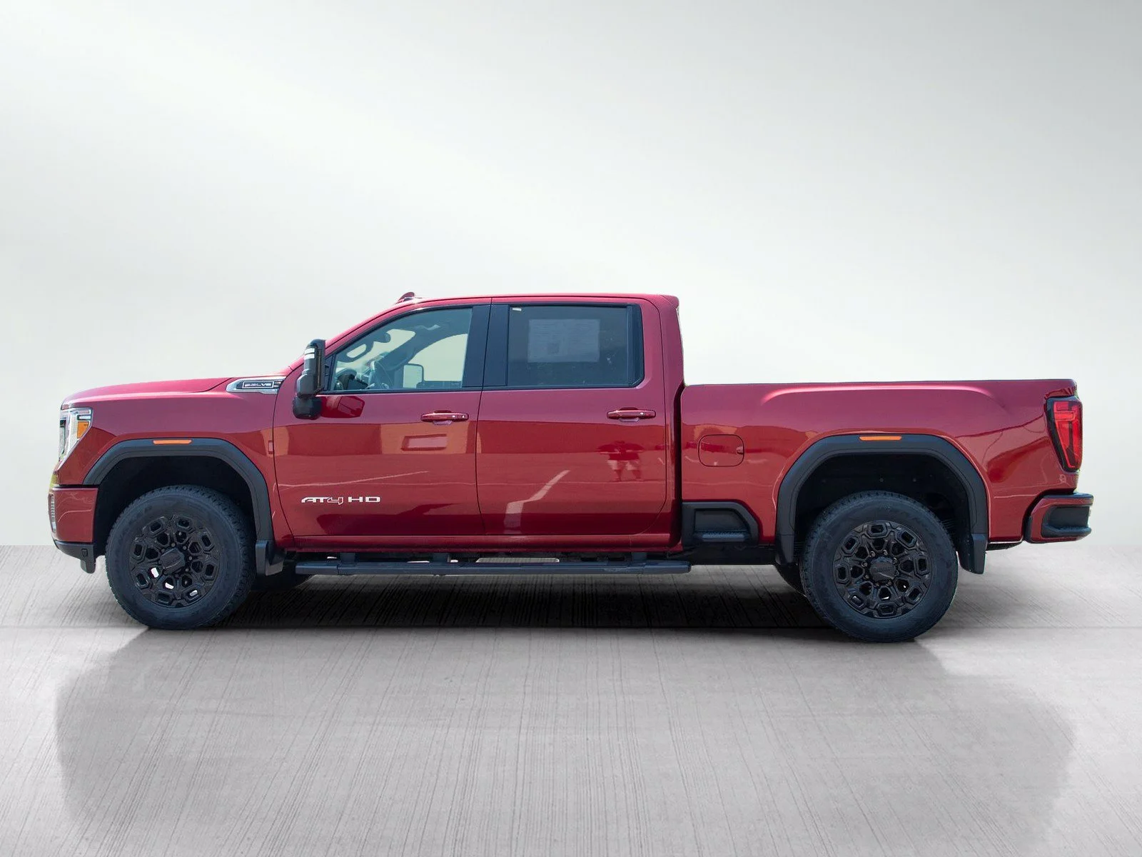 Used 2021 GMC Sierra 2500HD AT4 with VIN 1GT19PE73MF261702 for sale in Roseville, Minnesota