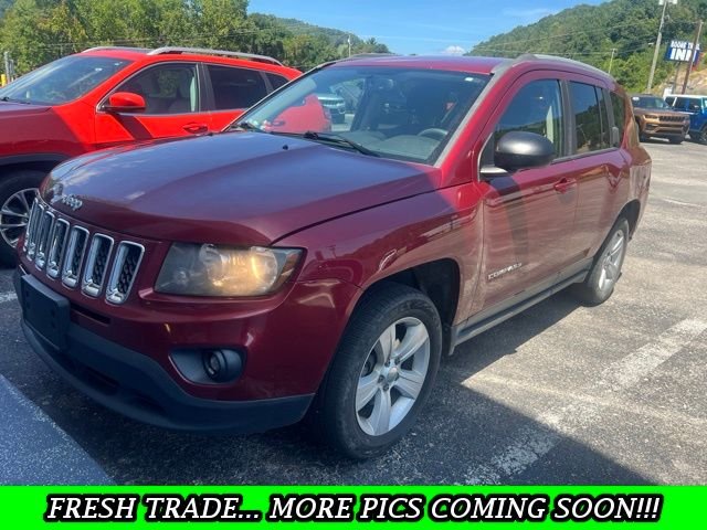 Used 2016 Red Jeep Sport image 1