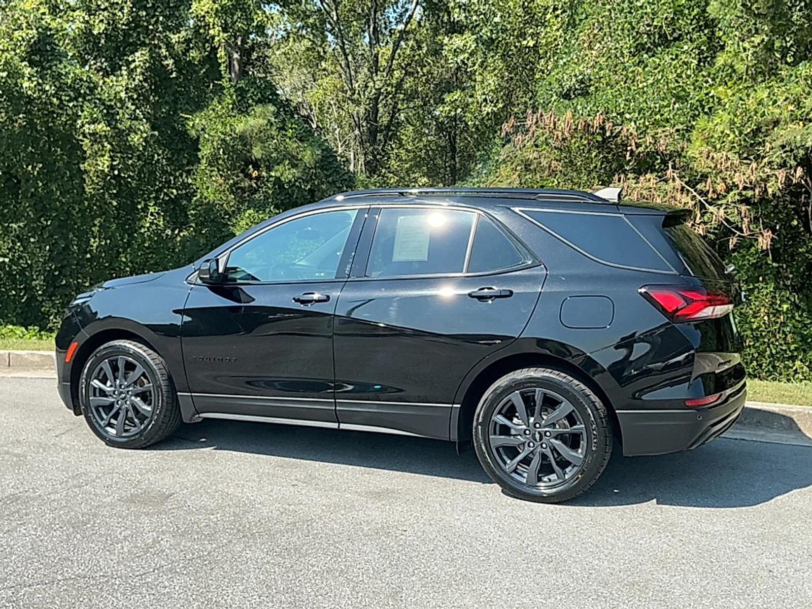 Used 2024 Mosaic Black Metallic Chevrolet FWD RS image 3