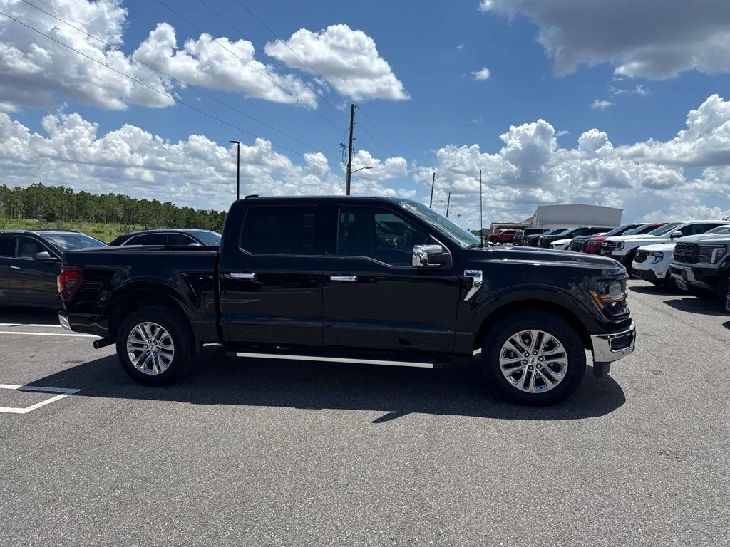 Used 2024 Agate Black Metallic Ford XLT image 1