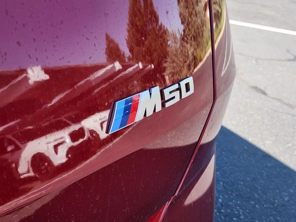 New 2026 Vegas Red Metallic BMW M50 xDrive image 21