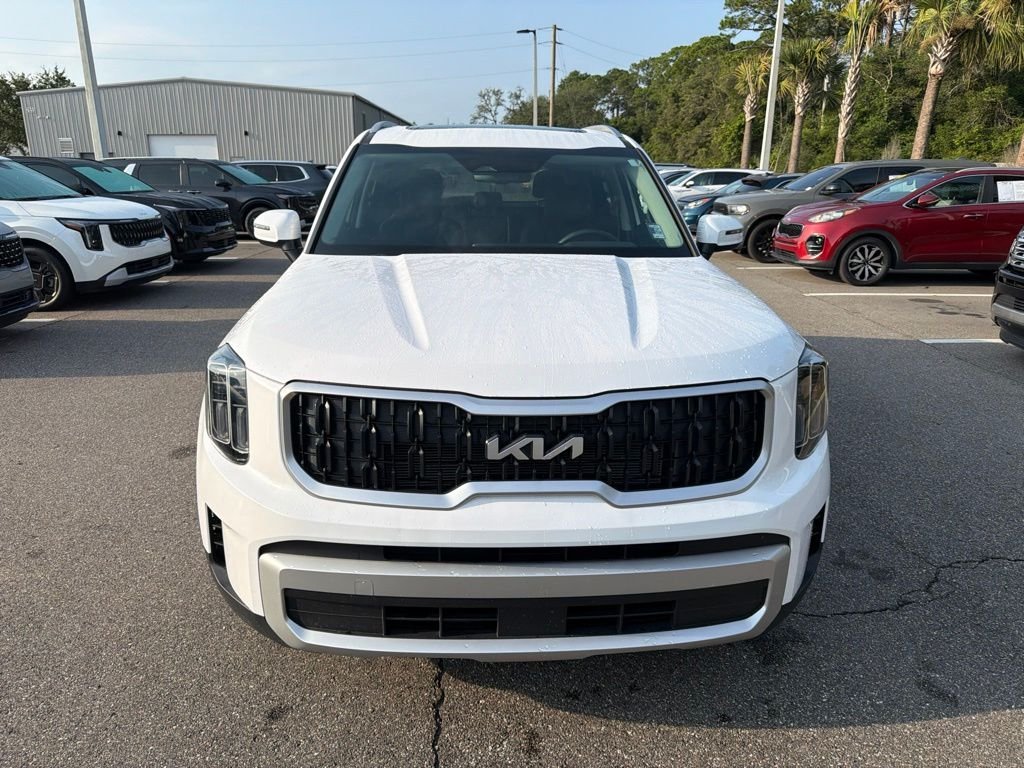 Certified Used 2025 White Kia EX image 2