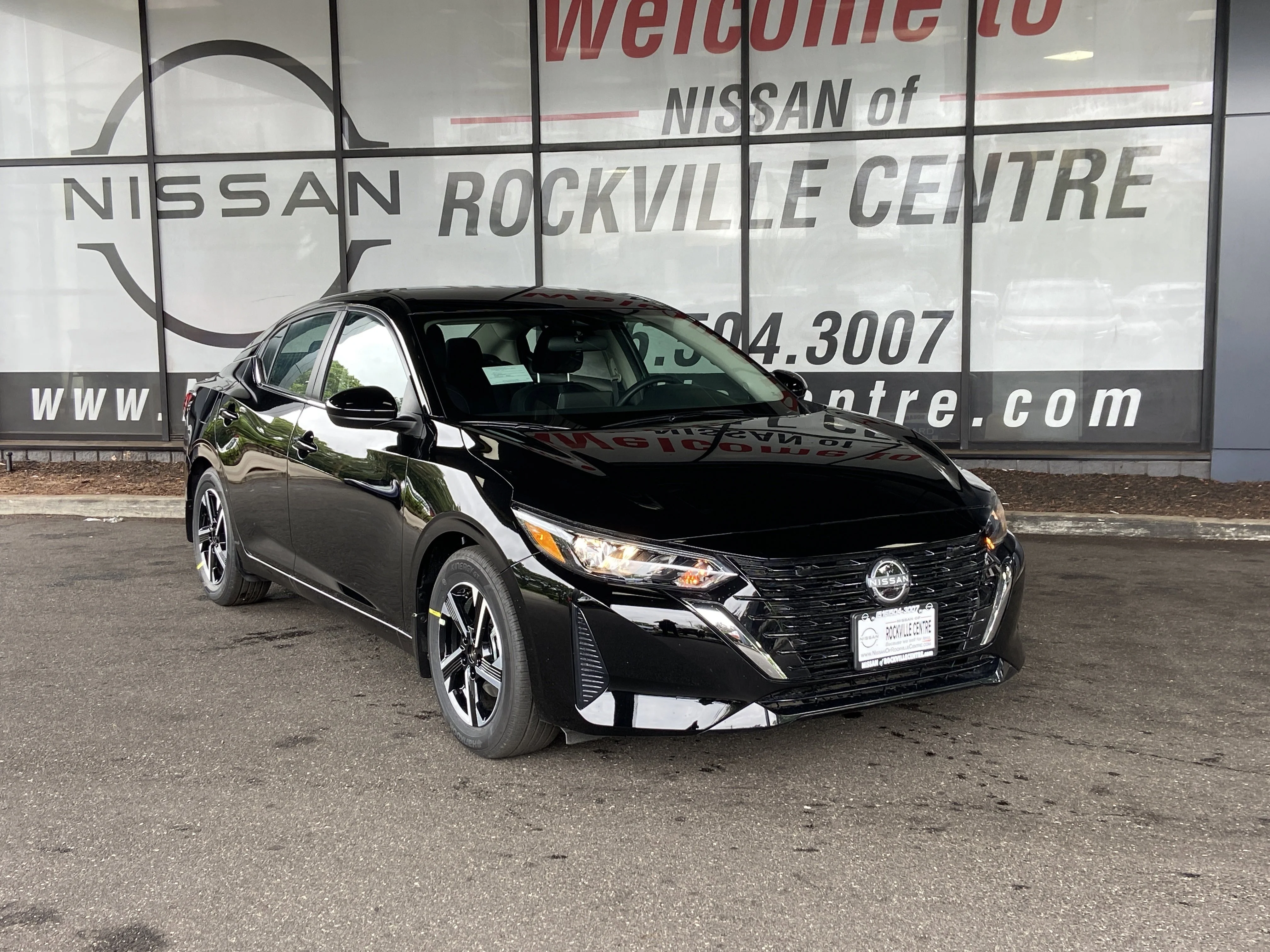 New 2025 Super Black Nissan SV image 1