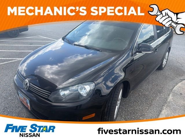 Used 2013 Black Volkswagen 2.0L TDI image 1