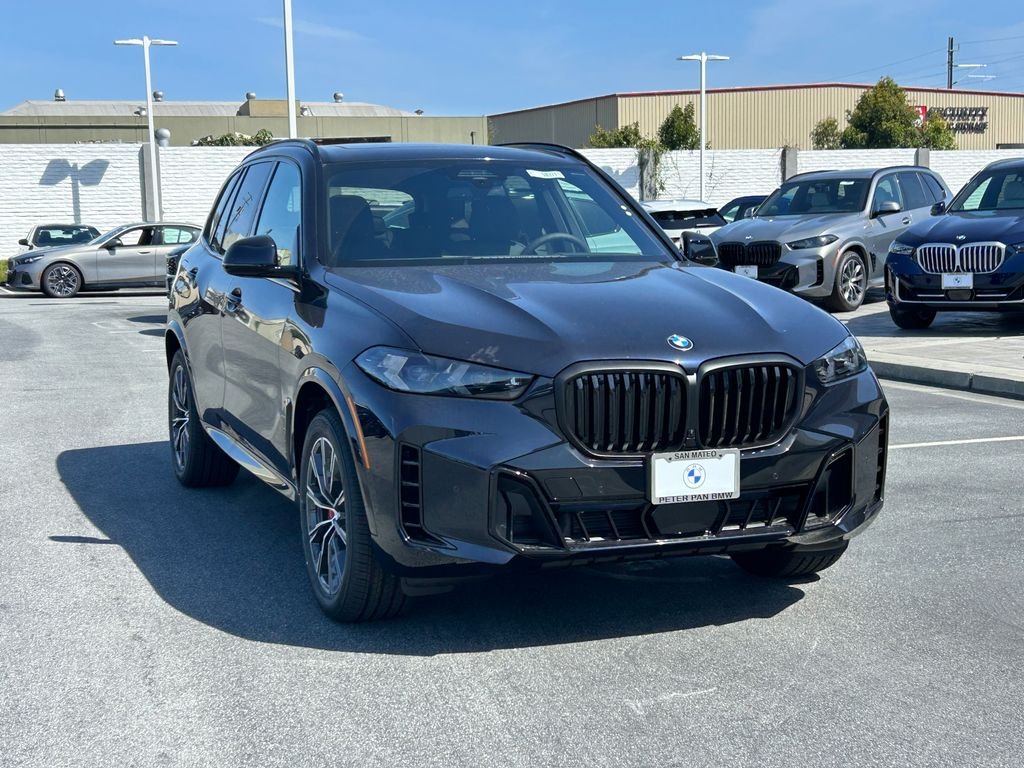 New 2026 Carbon Black Metallic BMW xDrive40i image 7