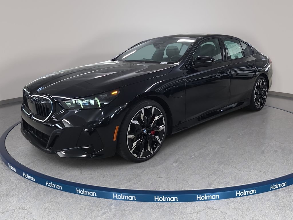 New 2027 Black Sapphire Metallic BMW 550e xDrive image 1