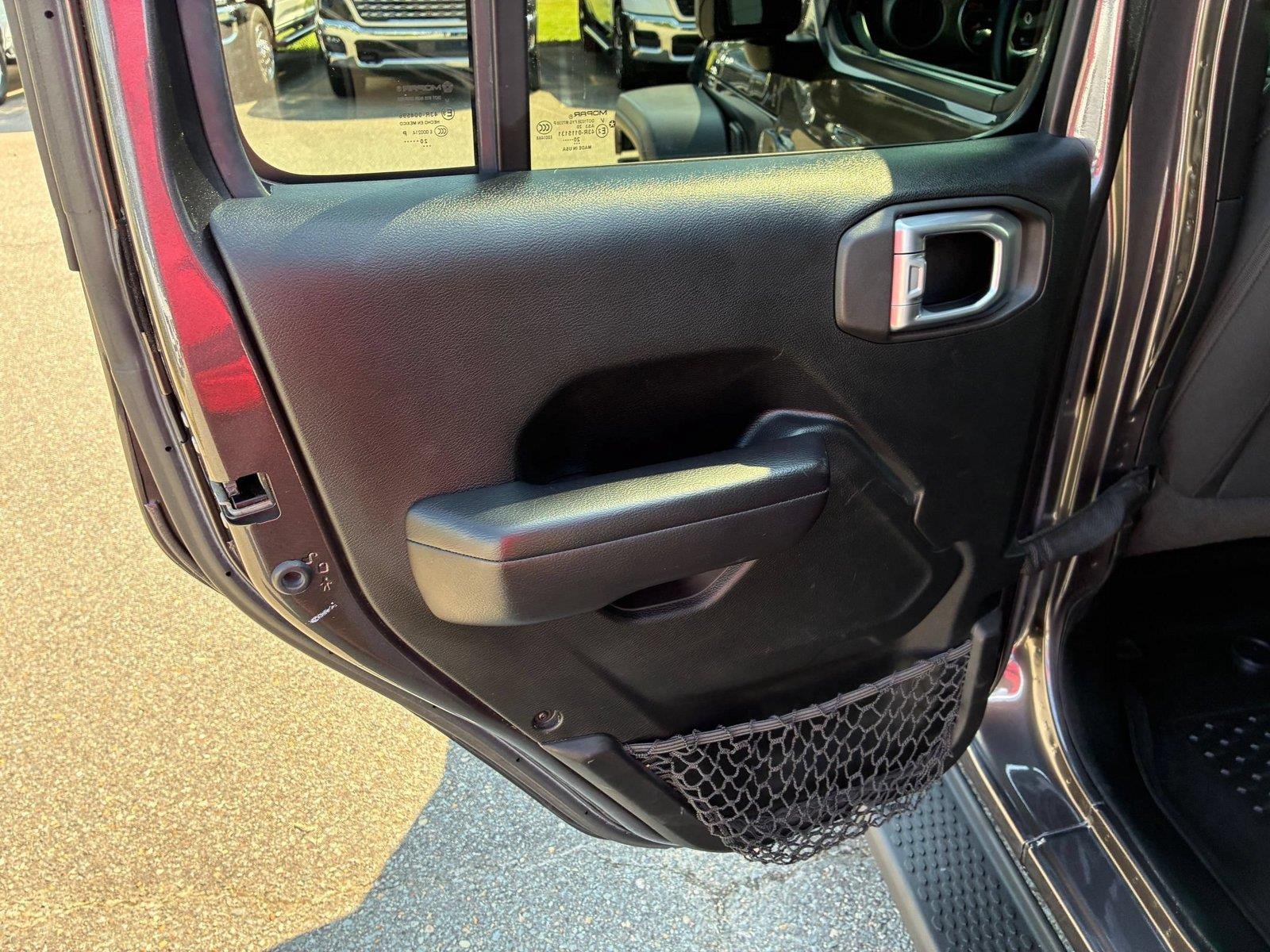 Used 2021 Granite Crystal Metallic Clearcoat Jeep Unlimited Sport S image 22