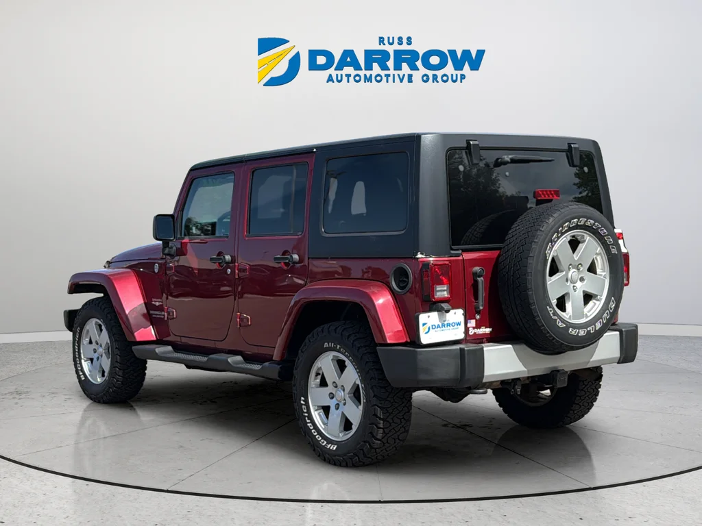 Used 2012 Red Jeep Unlimited Sahara image 3